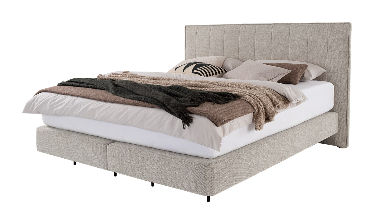 Couch from ADA. Mindful Living Nirina bed – Stylish and European-made